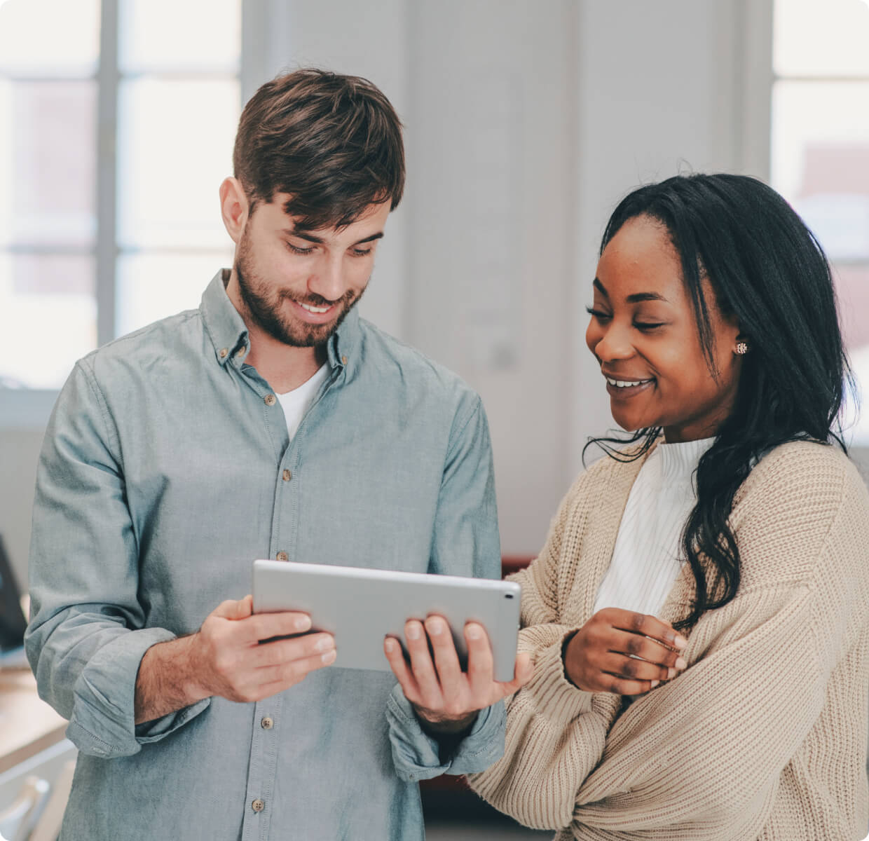 2 people checking Jigs on a tablet device.