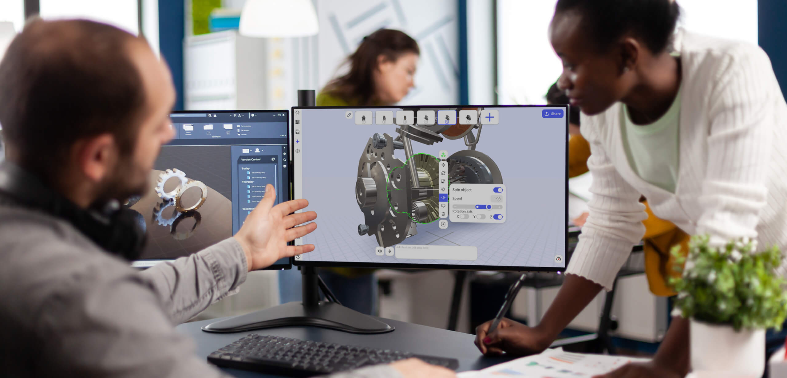 Team mates discussing a CAD mechanical design that has been turned into augmented reality using JigSpace.