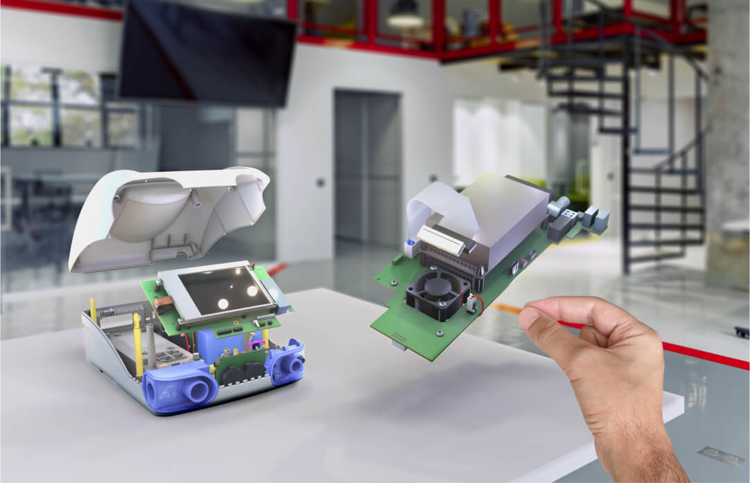 A medical device assembly being manipulated with hands in JigSpace spatial on Apple Vision Pro