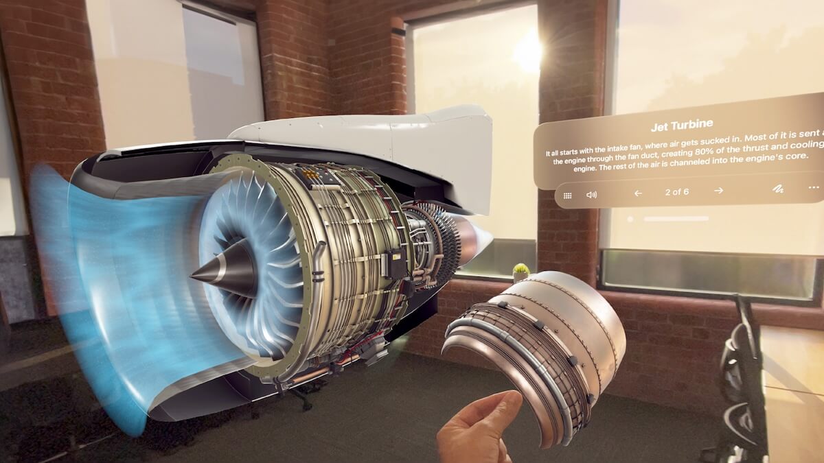 A jet engine assembly in spatial being pulled apart with hands in JigSpace on Apple Vision Pro