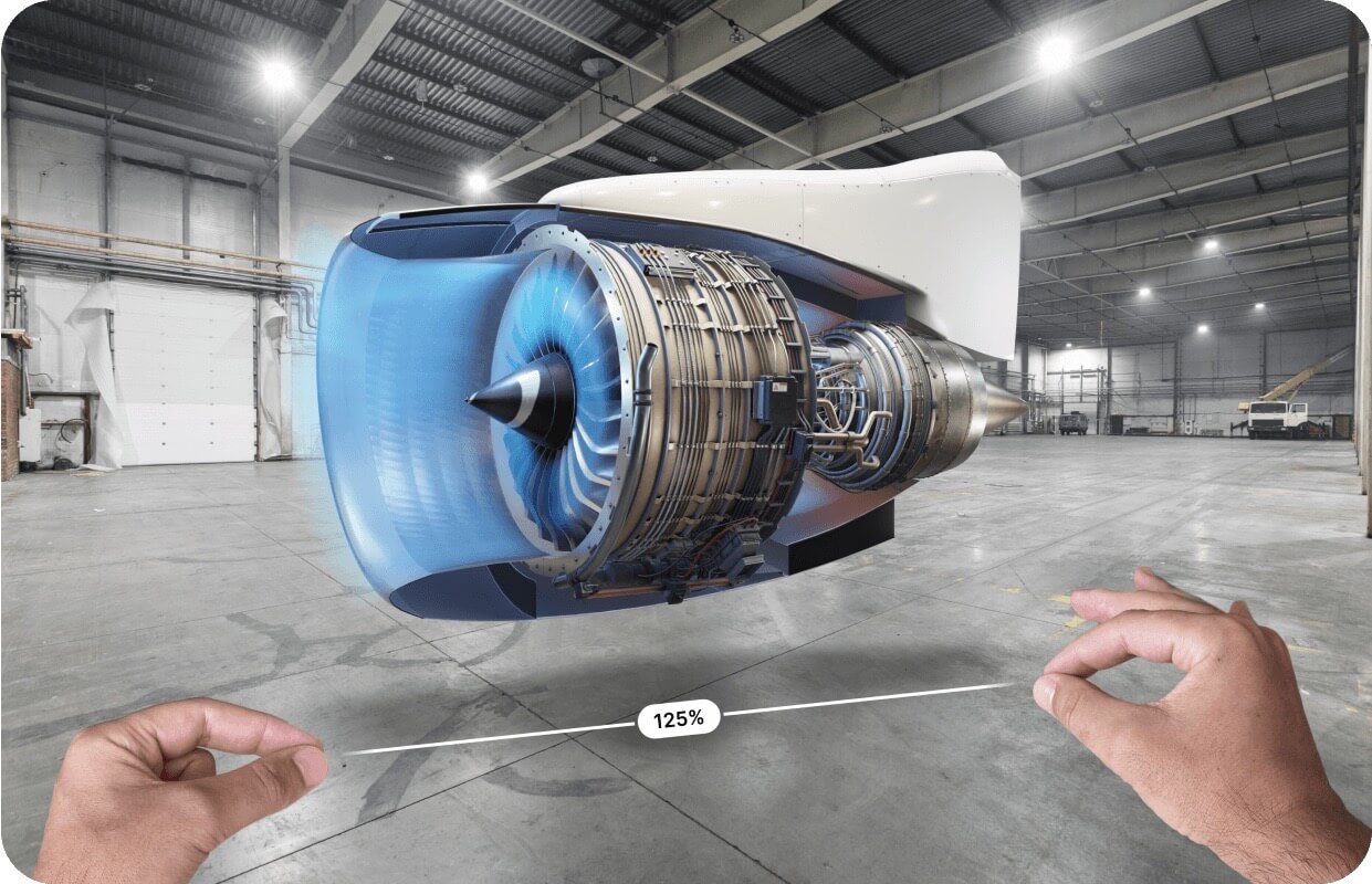 A jet engine in augmented reality on JigSpace for apple vision pro being resized by two hands
