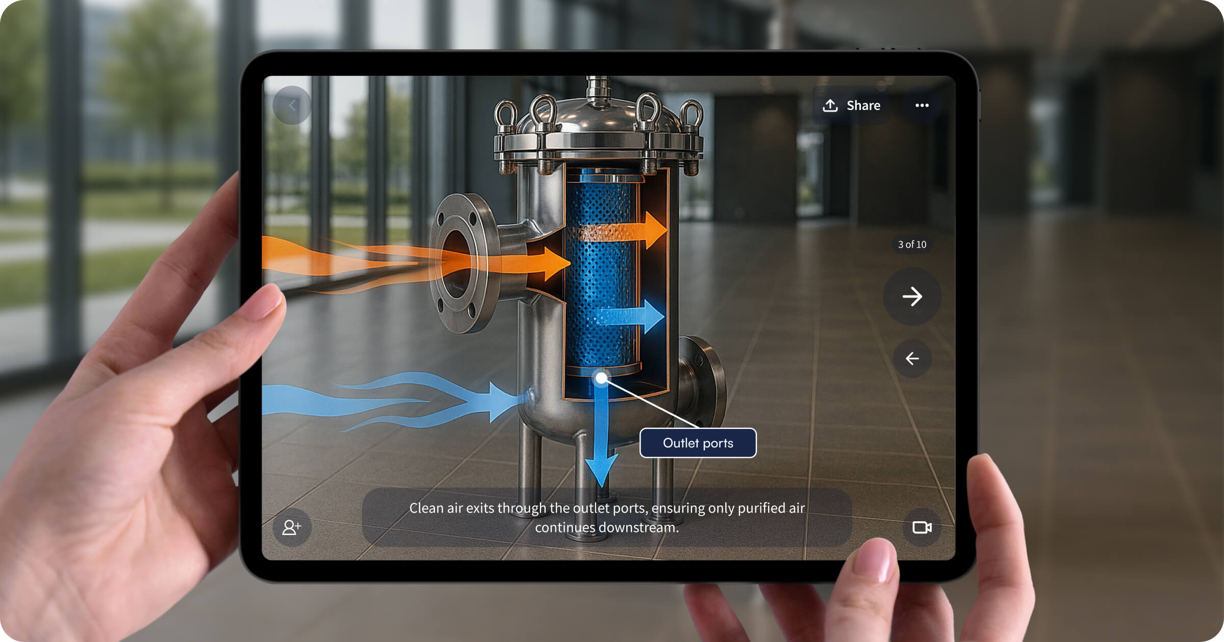 Person holding iPad displaying an augmented reality view of an industrial air filtration system, with colored arrows showing airflow and labels explaining outlet ports
