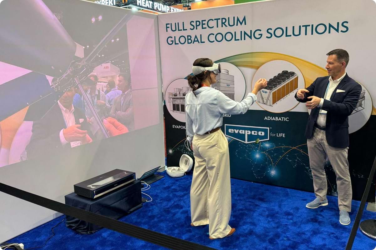 A HVAC trade show attendee views Evapco Jigs on Apple Vision Pro