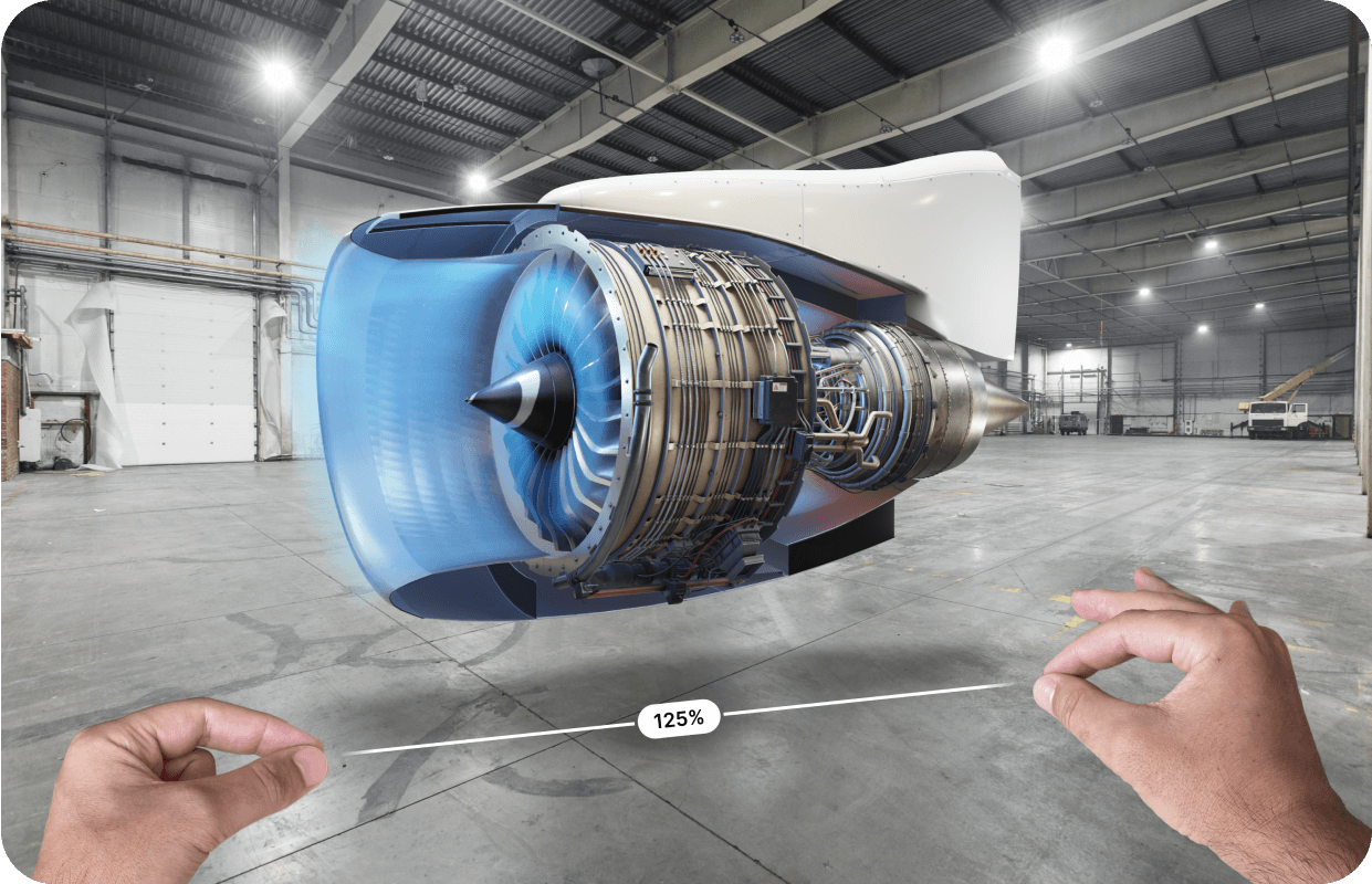 A jet engine in augmented reality on JigSpace for apple vision pro being resized by two hands